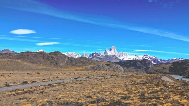 Road to the Peaks. Follow the winding road as it carries adventurers, with rolling hills on one side and the turquoise waters of the Rio de las Vueltas on the other.A thrilling preview of the wonders.