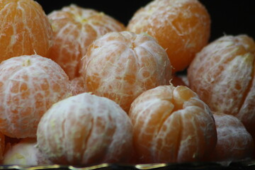 Tangerines without peel Close Up
