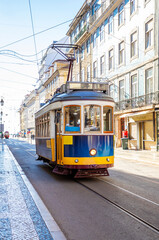 Vintage tram on the street of Baixa district in Lisbon, Portugal