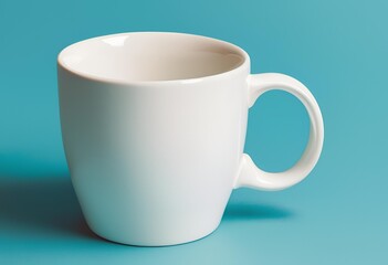 Blank white mug close up on blue background.