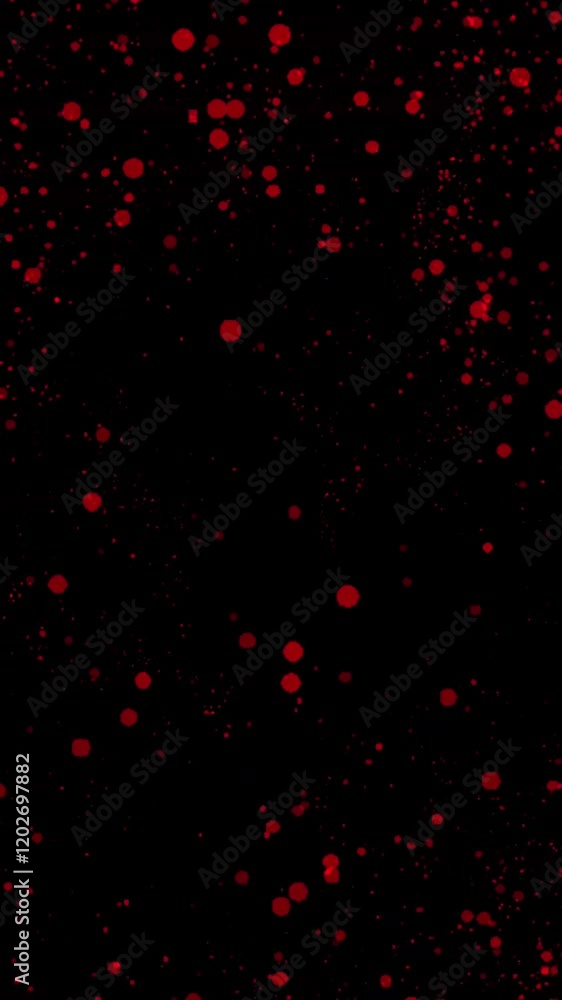 Poster Bright red confetti-like particles spread across a black background in an abstract pattern, Vertical video animation 
