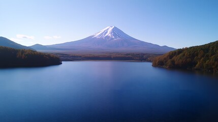 Obraz premium Majestic Mount Fuji Reflecting in a Tranquil Lake