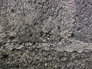 background of rough brick wall that has been around for a long time and is starting to erode