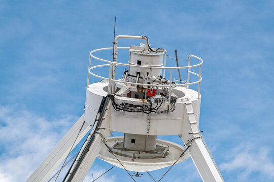Detail of the subreflector assembly on the parabolic dish of a radio telescope