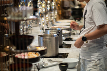 scooping the food, catering, dinner time