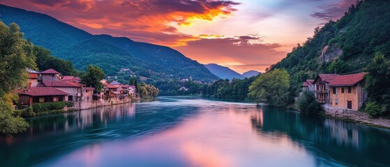 Fototapeta premium A serene riverside village scene powered by hydroelectric energy, showcasing nature and tranquility in a picturesque setting.