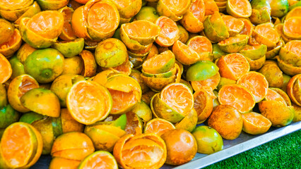 Orange peel is in the waste bin a the market fruit of Thailand 