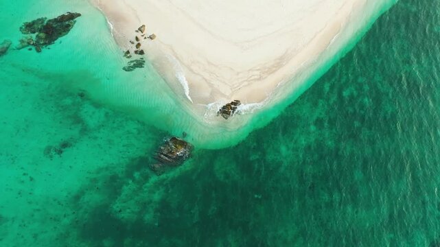 Nature of the beach and sea Summer with sunshine, sandy beaches, clear blue waters sparkling against the blue sky. On an island with good ecology and environment Background for summer vacation