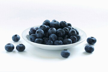 fresh blueberries or bilberry fruit isolated on white background,copy space,top view