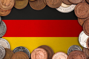 Coins on flag of Germany . trading investment business currency concep 