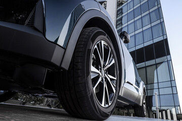 Car showroom. Aluminum wheel. automobile wheel tire. aluminium rims. Motor Corporation is Japanese automotive manufacturer.