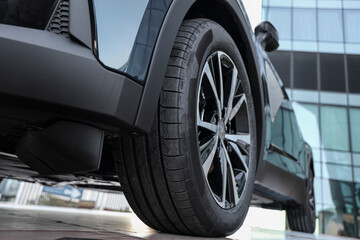 Car showroom. Aluminum wheel. automobile wheel tire. aluminium rims. Motor Corporation is Japanese...