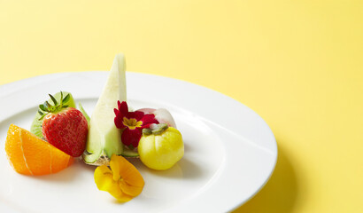 Fruit and cake on a plate