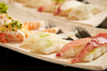 Different types of sushi on a plate