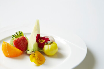 Fruit and cake on a plate