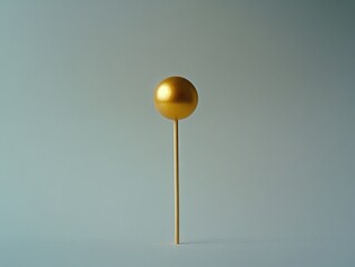Golden Ball on Wooden Stick