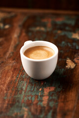 Cup of coffee on wooden background. Soft focus. Copy space.	