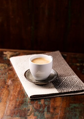 Cup of coffee on wooden background. Soft focus. Copy space.	
