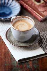 Cup of coffee on wooden background. Soft focus. Copy space.	