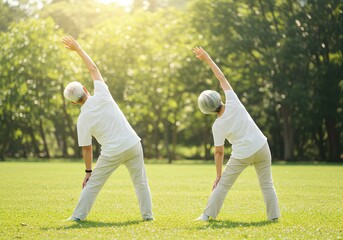 シニア男女。後ろ姿。ストレッチ。体操。健康維持。新緑の背景｜Senior men and women. Back view. Stretching. Exercising. Staying healthy. Fresh green background.