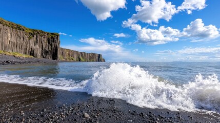 Ocean wave crashing on black sand beach