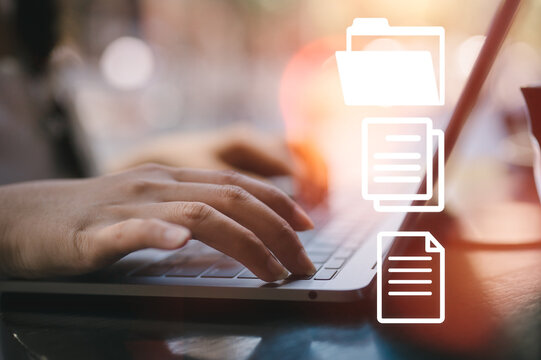 document management concept.Businesswoman working with laptop computer with icons on virtual screen compliance rules and law regulation policy on virtual screen, documents with checkbox lists ERP.