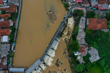 Aerial view of the Katulampa dam in Bogor, Indonesia during flood conditions