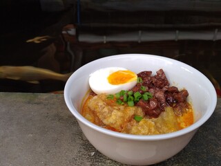 Spicy Cow Skin Stew with a Boiled Egg and Stir-fried Tempeh