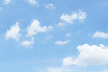 Beautiful clouds during spring time in a Sunny day. Blue sky and white fluffy clouds