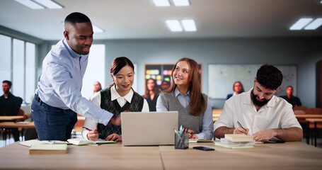 People Studying Knowledge In Classroom Indoors