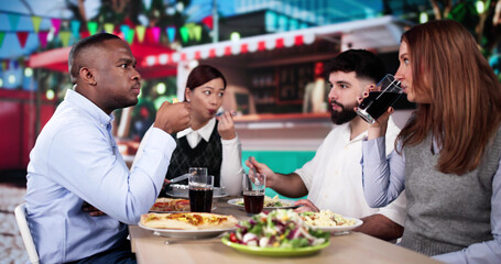 People Having Funh At Street Food Event