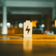 Technology battery high power electric energy with a connected charging cable. Battery to electric cars and mobile devices with clean electric, Green renewable energy battery storage future.