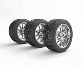 Set of Four Black Car Tires with Alloy Wheels on White Background