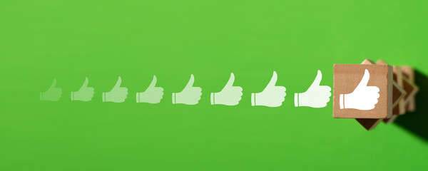 Fototapeta premium Growing thumbs up symbols. Social media. Like