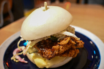 Handmade hamburgers with fresh vegetables and chicken