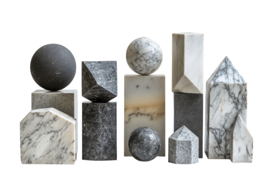 Collection of geometric shapes made of marble and stone displayed artfully on a white background