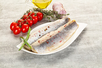 Marinated herring fillet with green onion