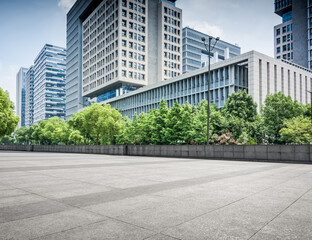 Obraz premium Urban Landscape: Modern Architecture and Green Spaces in a City