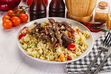 Traditional couscous with beef and vegetables