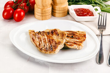 Grilled pork steak with sauce