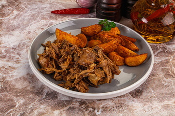 Baked shredded pork with potato