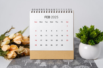 February 2025 Desk Calendar with Flowers and Potted Plant