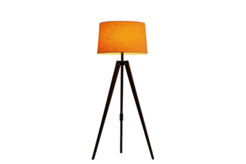 Stylish orange lampshade on a modern tripod floor lamp in a minimalist living space