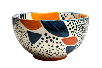 Decorative ceramic bowl with abstract patterns in vibrant colors displayed against a neutral background