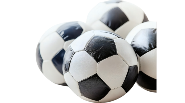 Close-up of Stacked Classic Black and White Soccer Balls, isolated on transparent background