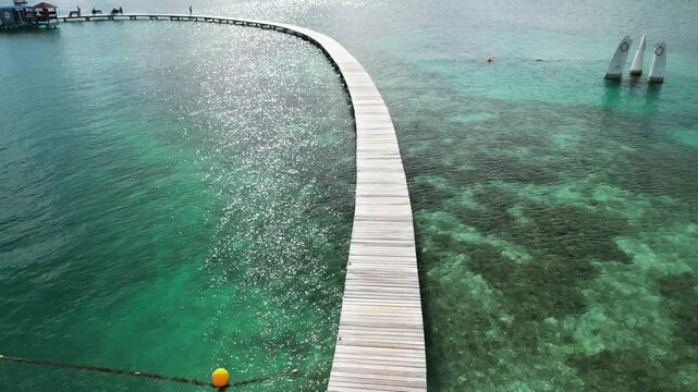 wooden bridge on the beach aerial, martinica, martinique, sainte anne