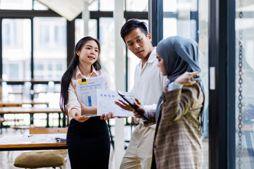 Young business asian colleague discussion with window background Financial Advisor discussion with...