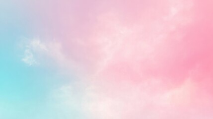 Naklejka premium Soft pastel clouds blending pink and blue hues in the sky.