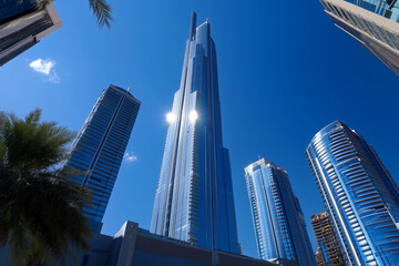 Fototapeta premium Modern Skyscrapers Against a Blue Sky