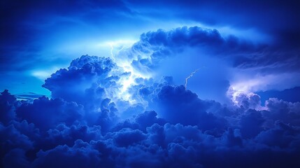 Obraz premium Captivating view of a light thunderstorm with striking lightning against a vibrant blue sky capturing the moment clouds gather with an intense electric charge ready to unleash nature's fury